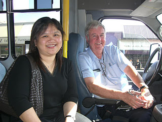 bus driver and woman passenger  